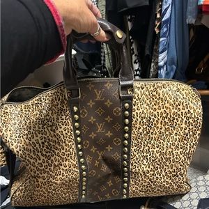 Large duffle bag with Louis Vuitton canvas added to it!